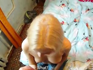 Babe In Jeans Gives A POV Blowjob In The Bedroom